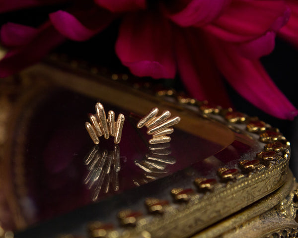 Unique, gold stud earrings