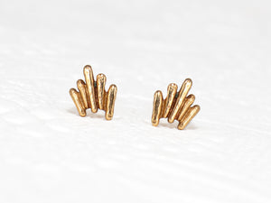 Unique, gold stud earrings