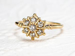 Snowflake inspired diamond cluster ring, front view