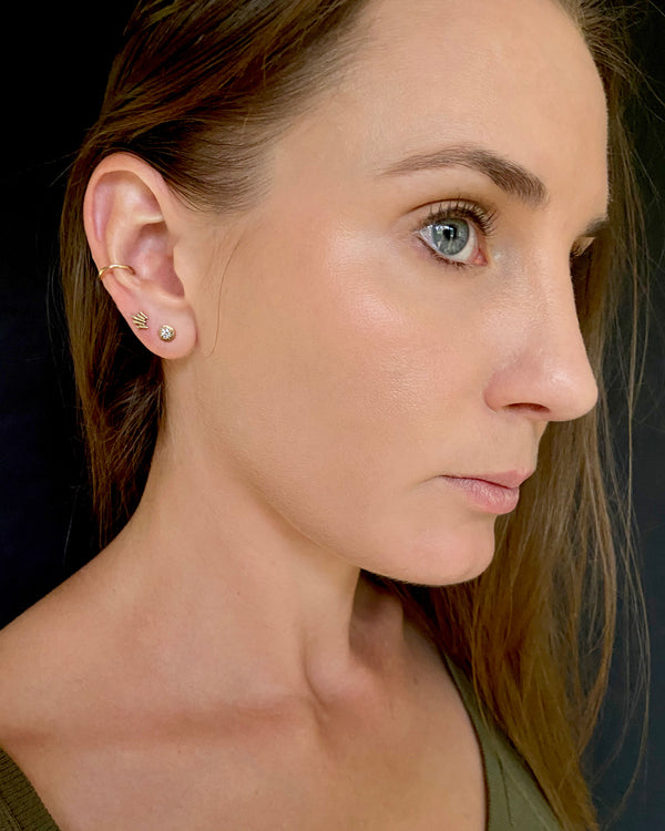 Unique diamond stud earrings with vintage style modeled