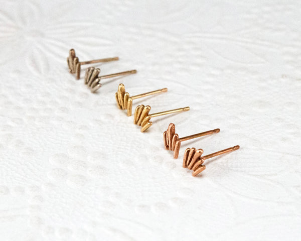 Unique, gold stud earrings, top view