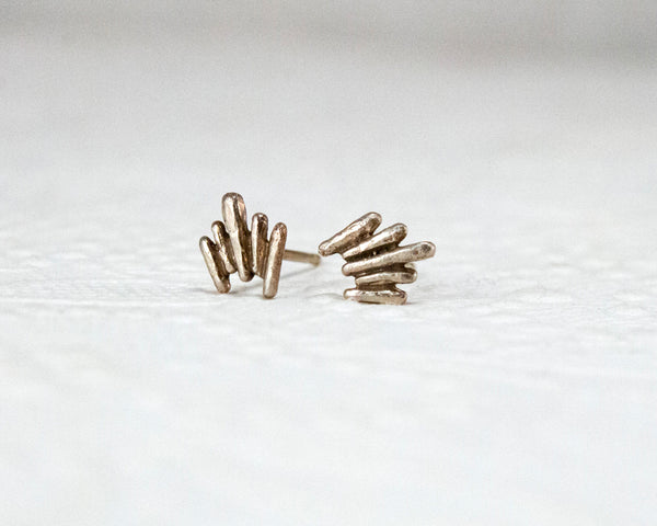 Unique, white gold stud earrings