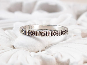 Eternity-style, sterling silver flower ring