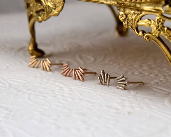 Unique, 14k gold stud earrings