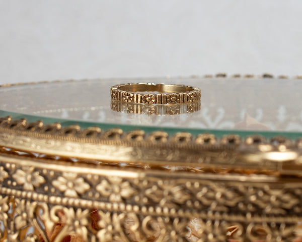 Gold floral wedding band, eternity style