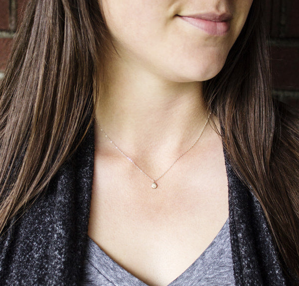 Mixed metal, hammered pendant, modeled