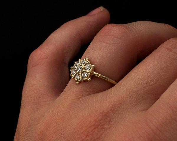 Snowflake inspired diamond cluster ring, side view modeled