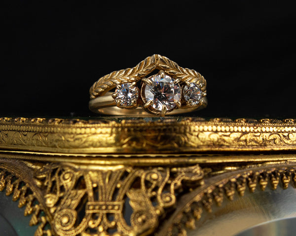 Handcrafted, three stone engagement ring