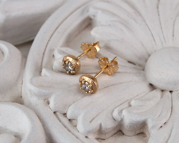Unique diamond stud earrings with vintage style, top view