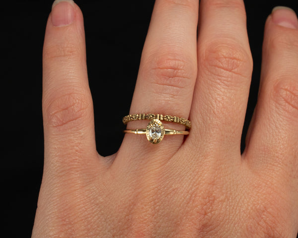 solid 14k gold, floral wedding band modeled