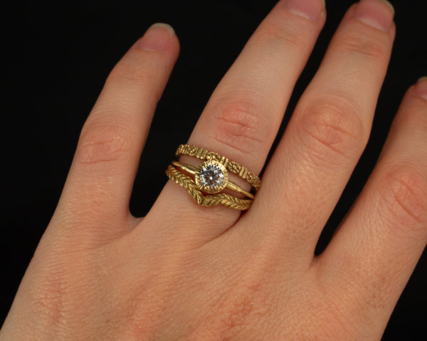 Gold floral wedding band, eternity style stacked