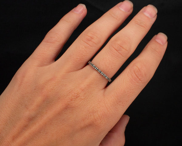 Sterling silver flower eternity band, modeled