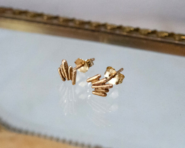 Unique, gold stud earrings