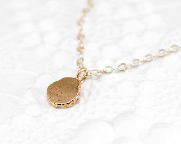 Mixed metal, hammered pendant