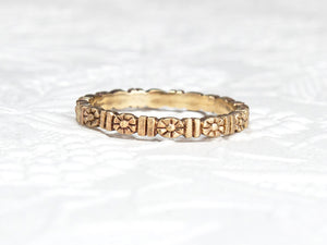 Gold floral wedding band, eternity style