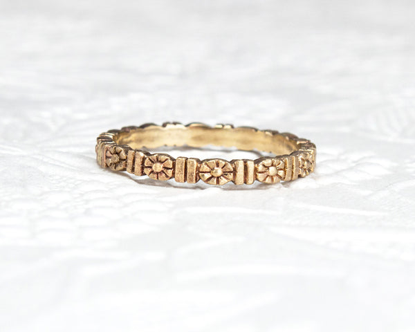 Gold floral wedding band, eternity style