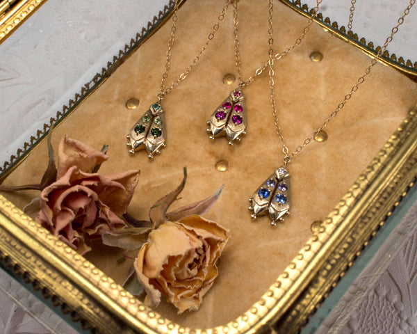 solid gold firefly jewelry, handmade beetle necklaces, front view