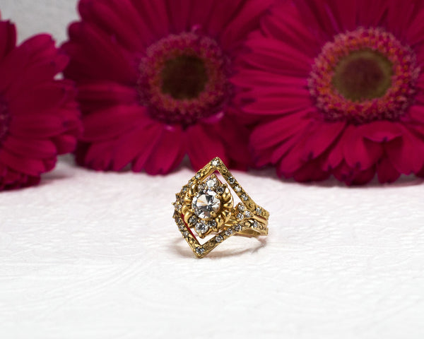 Unique, vintage style engagement ring stacked with bands