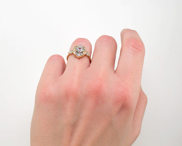 low profile, vintage style engagement ring modeled