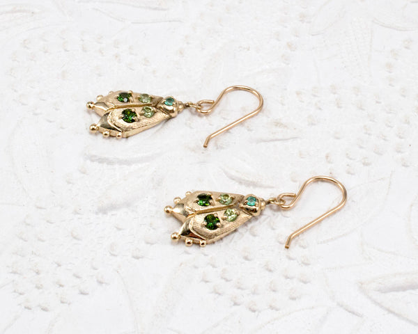 Handmade firefly jewelry, solid gold earrings with green gemstones