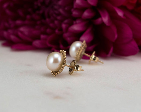 Handmade, gold pearl stud earrings, side view