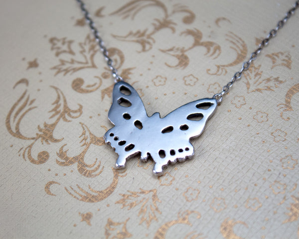 Reverse side of handmade sterling silver butterfly necklace