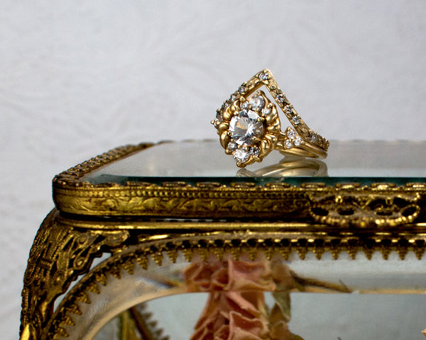 Unique, vintage style engagement ring stacked with band