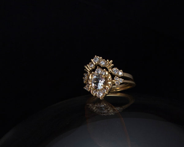 Unique, vintage style engagement ring stacked with band