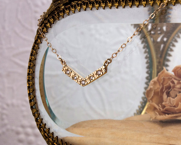 Solid gold and diamond V chevron necklace