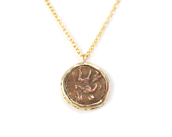 reverse side of an ancient coin necklace