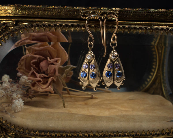 Handmade firefly jewelry, solid gold earrings with blue gemstones