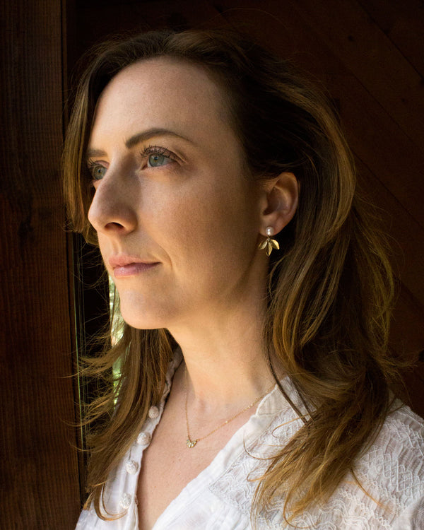 Gold pearl drop earrings, wedding jewelry modeled