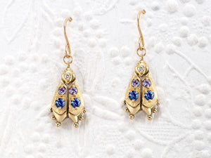 Handmade firefly jewelry, solid gold earrings with blue gemstones