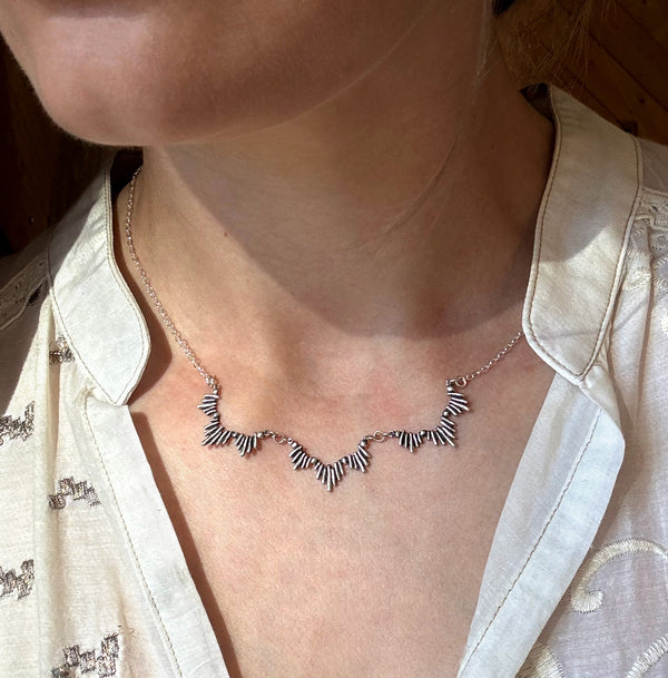 sterling silver sunburst statement necklace