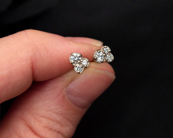 Diamond cluster earrings in 14k gold