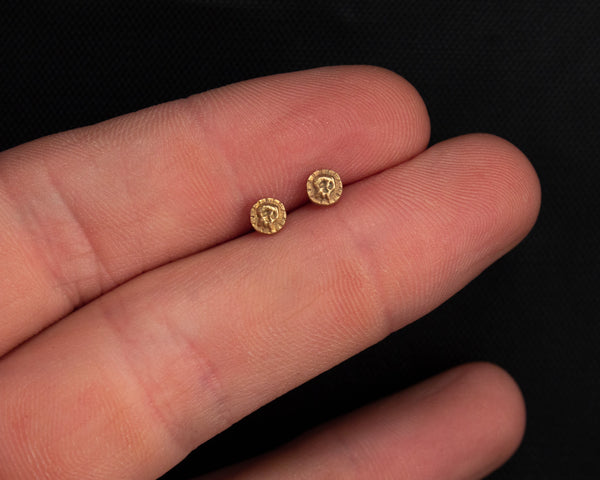 Small skull stud earrings, solid gold