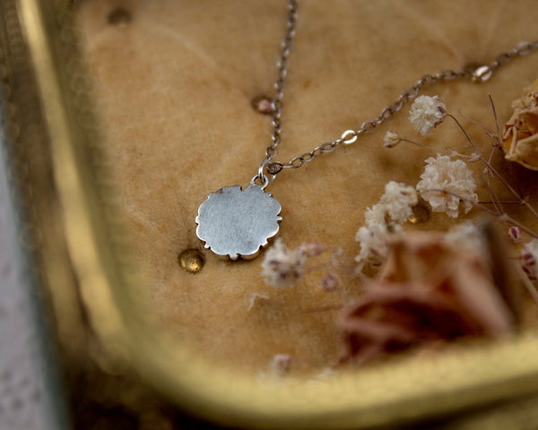 reverse of Handmade silver flower necklace 