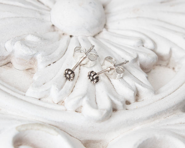 Small, tiny daisy flower stud earrings in sterling silver