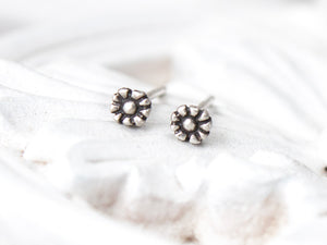 Small, tiny daisy flower stud earrings in sterling silver