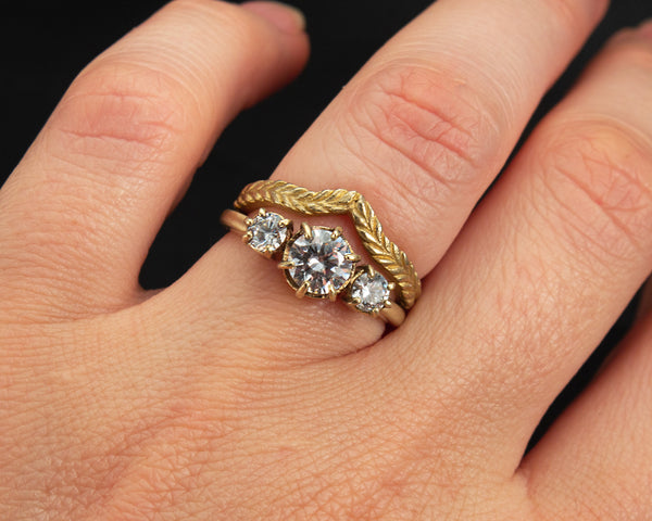 Handcrafted, three stone engagement ring