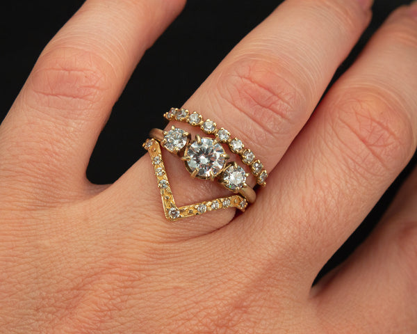 Handcrafted, three stone engagement ring
