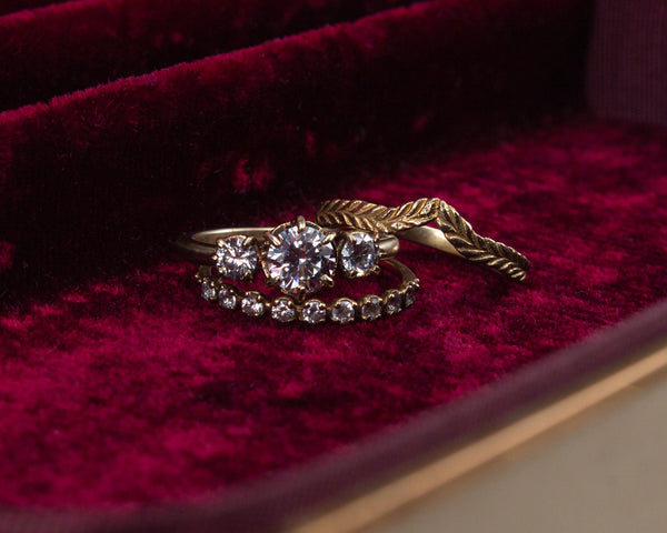 Handcrafted, three stone engagement ring