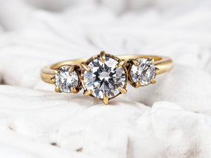 Handcrafted, three stone engagement ring