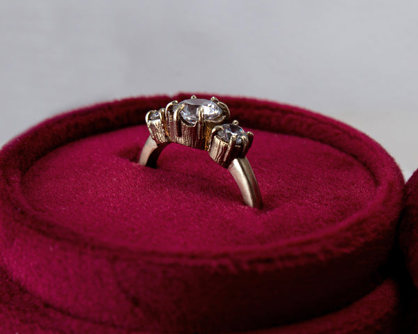 Handcrafted, three stone engagement ring