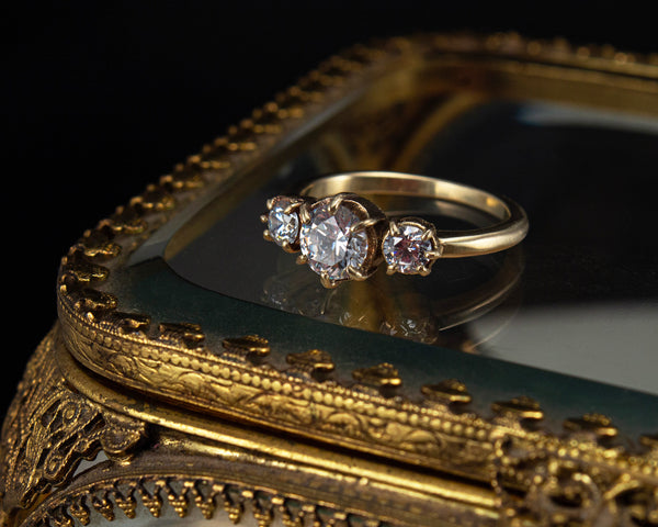 Handcrafted, three stone engagement ring