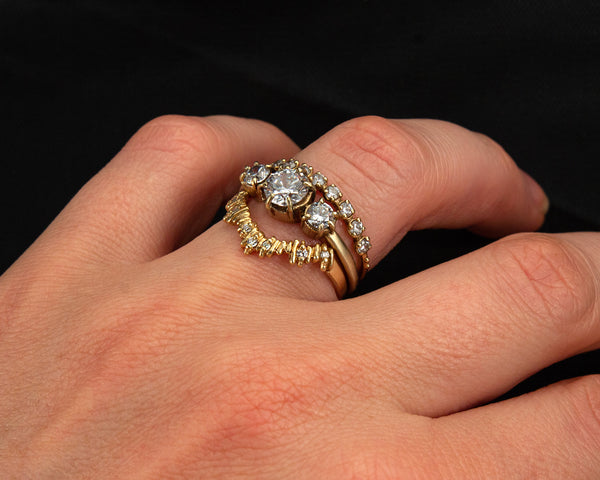Handcrafted, three stone engagement ring