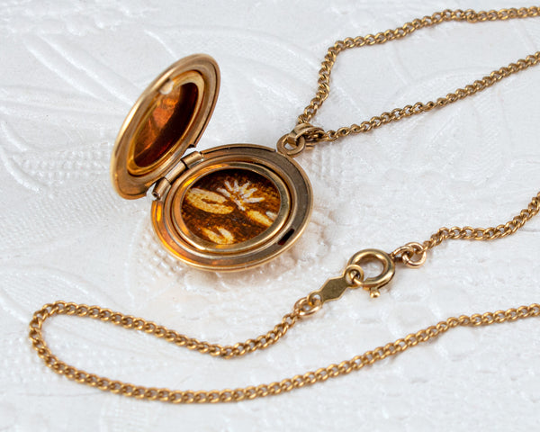 Gold-filled vintage locket necklace with lily pads