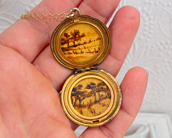 Vintage locket necklace with landscape paintings