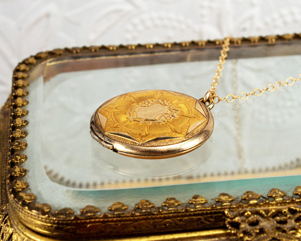 Vintage locket necklace with landscape paintings