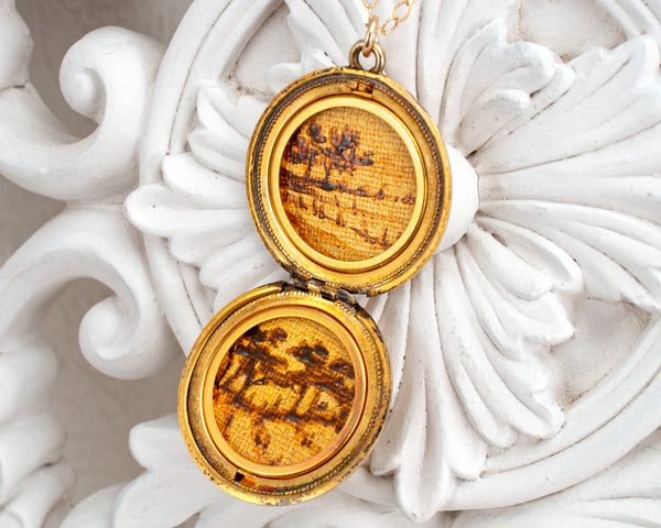 Vintage locket necklace with landscape paintings